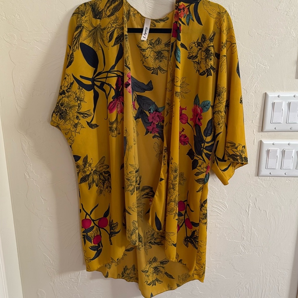 Saffron color kimono style wrap.